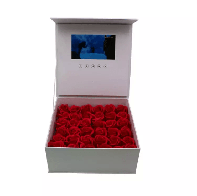 A White LCD Video Gift Box Full of Roses